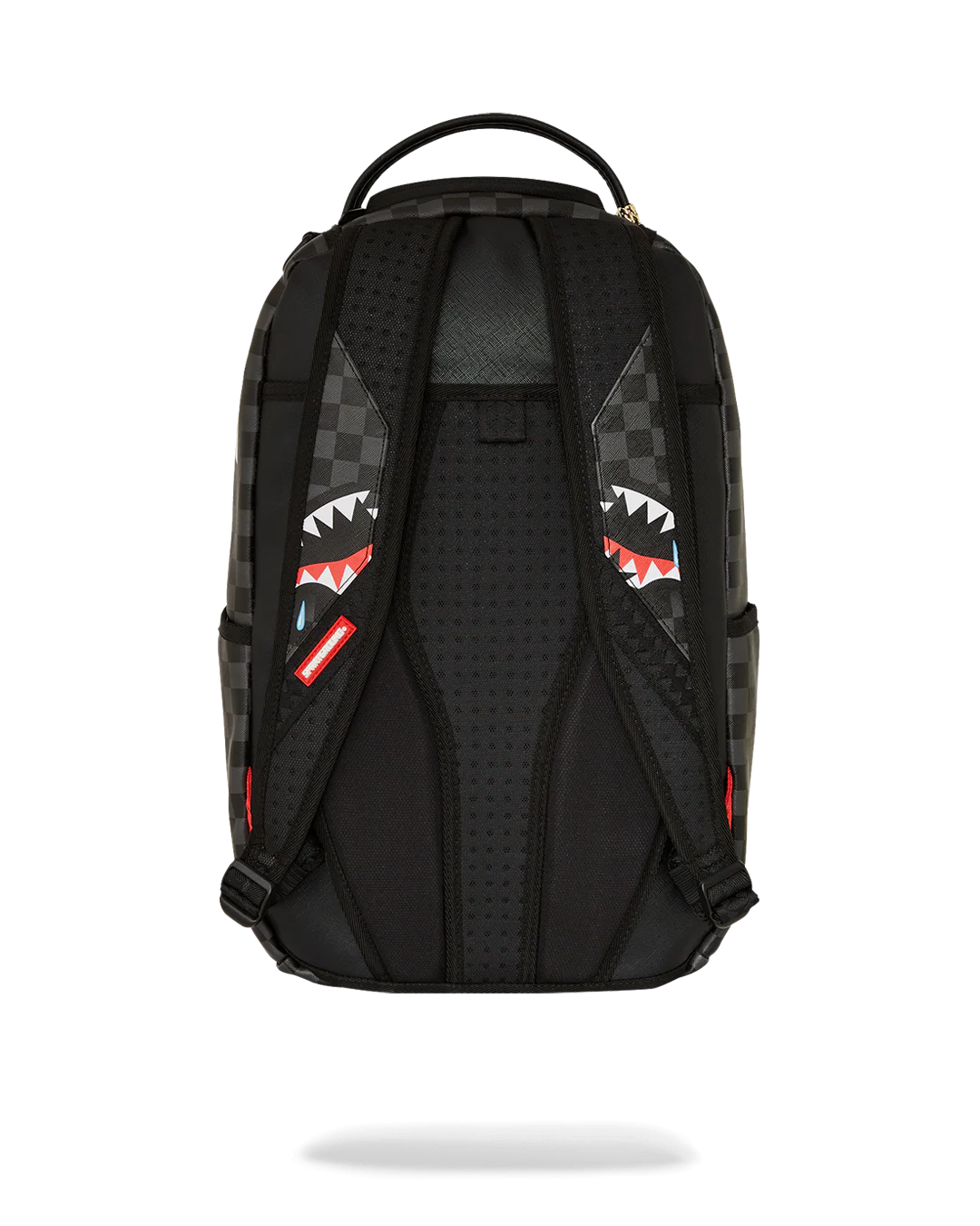 Black backpack with shark mouth design on a white background