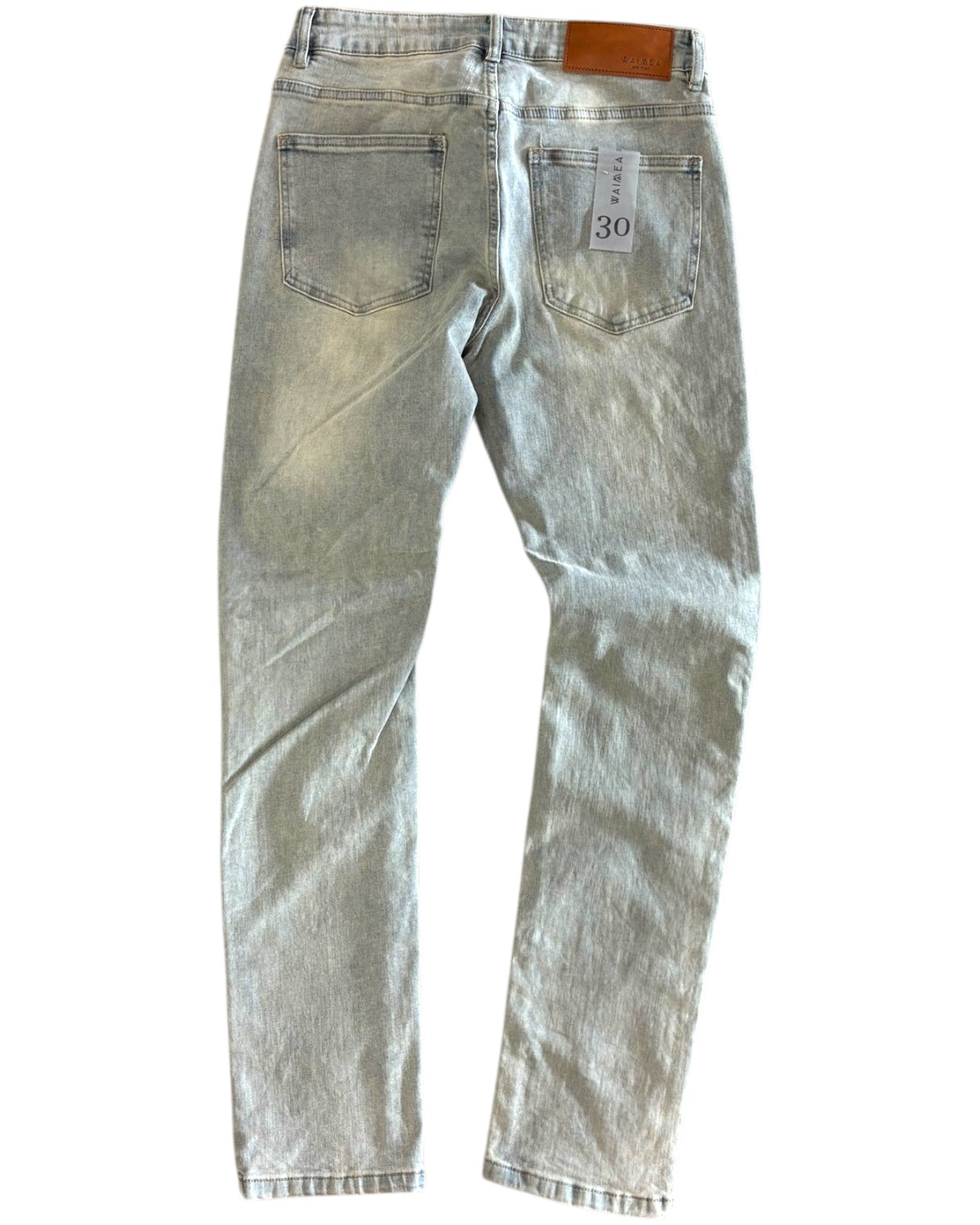 Light blue jeans with a visible brand label on a white background