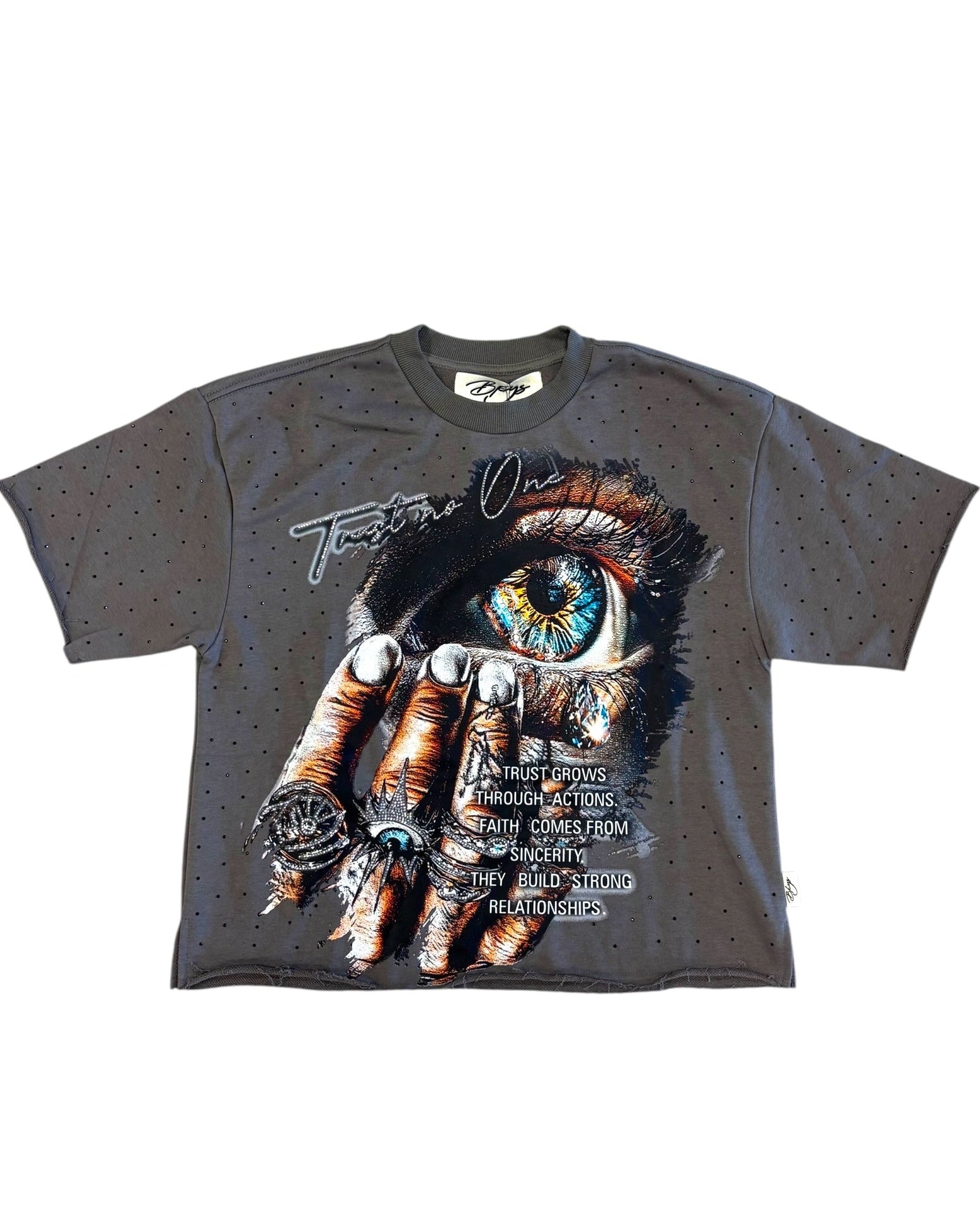 Gray t-shirt with a graphic design of a hand holding a eye and text on a white background