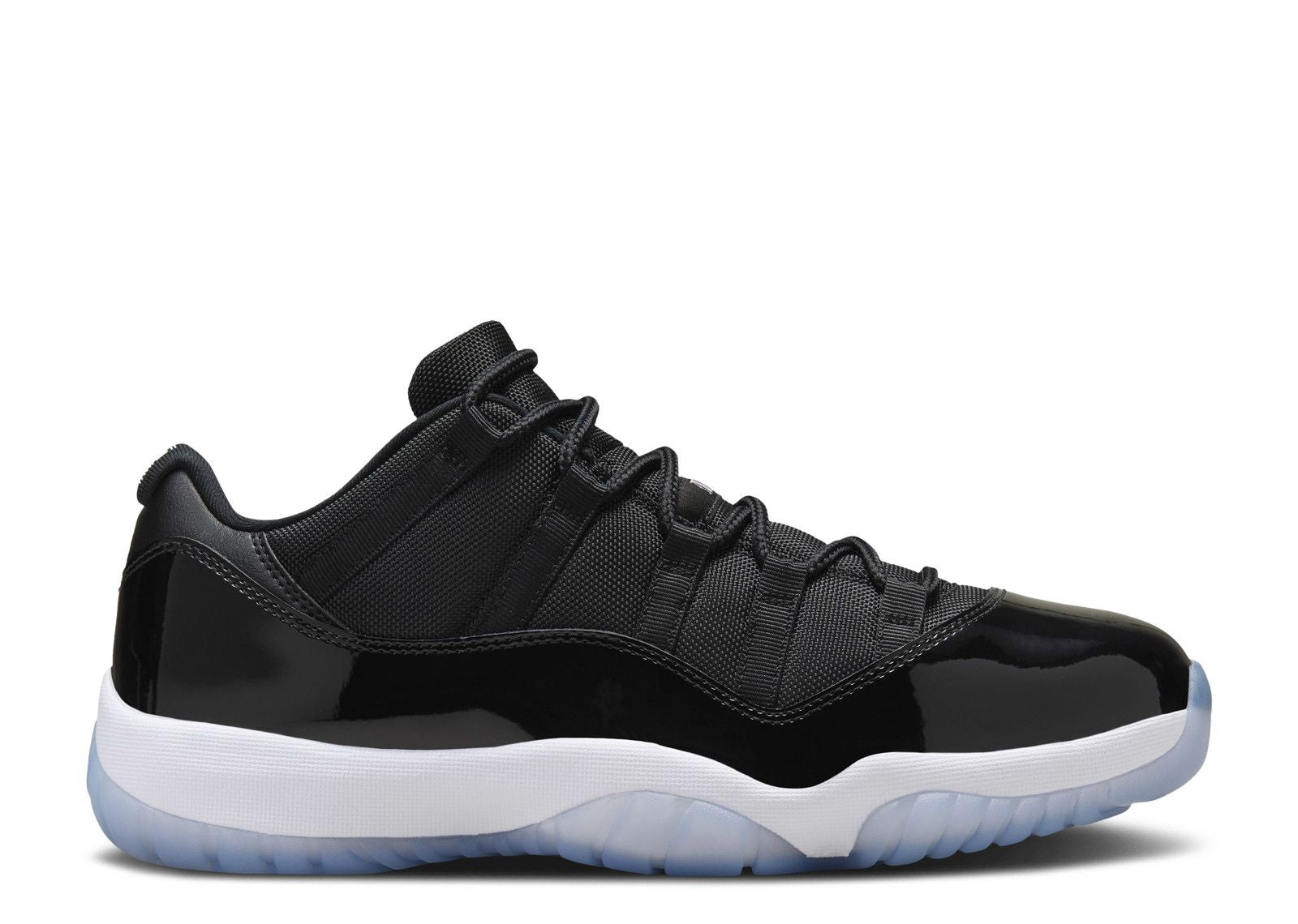 A side view of the Jordan Retro 11’s Low Space Jam. Icy blue bottoms with a white rubber insole. Next is the patent leather overlaying the regular leather materials displaying the signature Jordan 11’s pattern. The shoe is finished off with black laces.