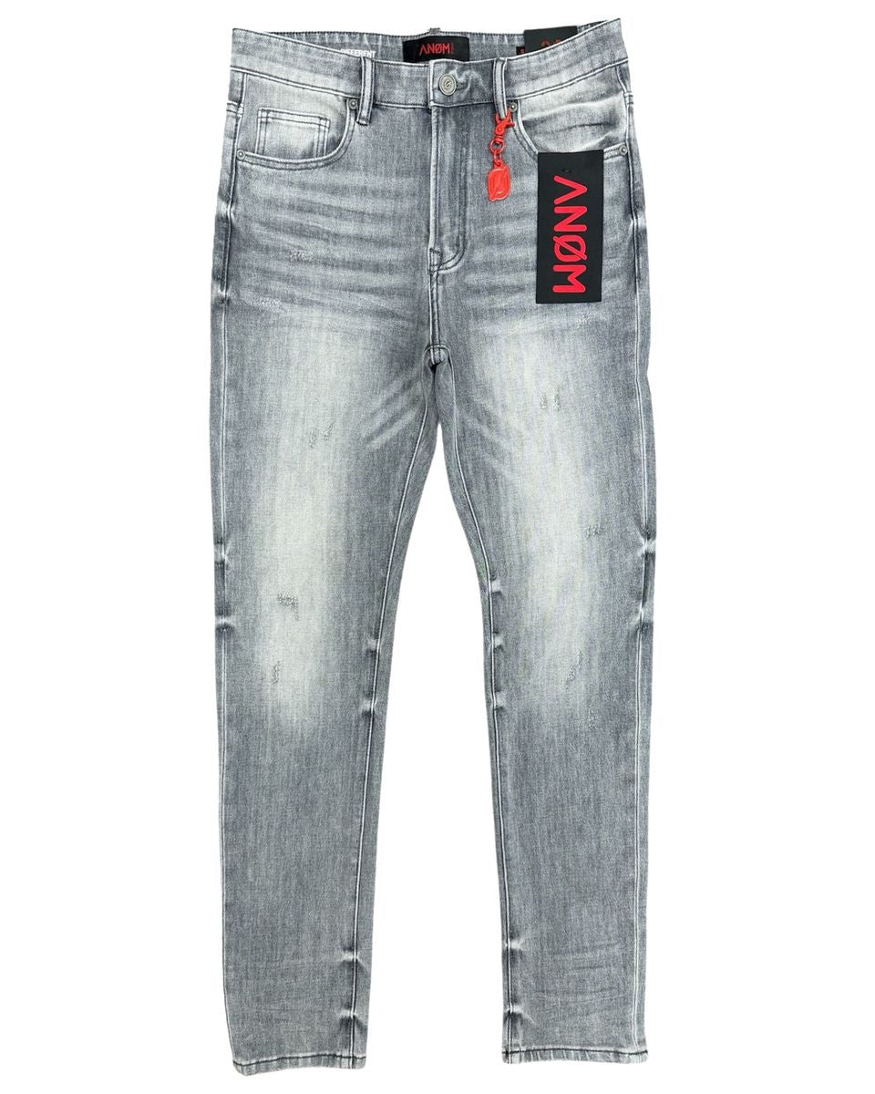 Gray distressed jeans with a brand label on a white background
