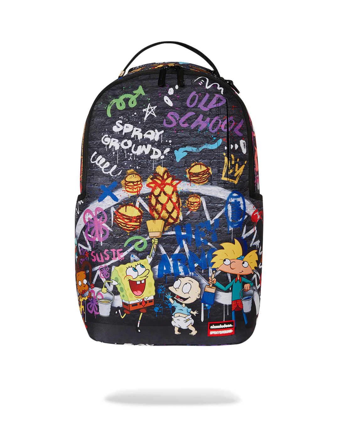 sprayground backpack showcasing various 90s nicktoons characters and graffiti designs 