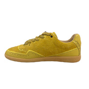 Yellow sneaker on a white background