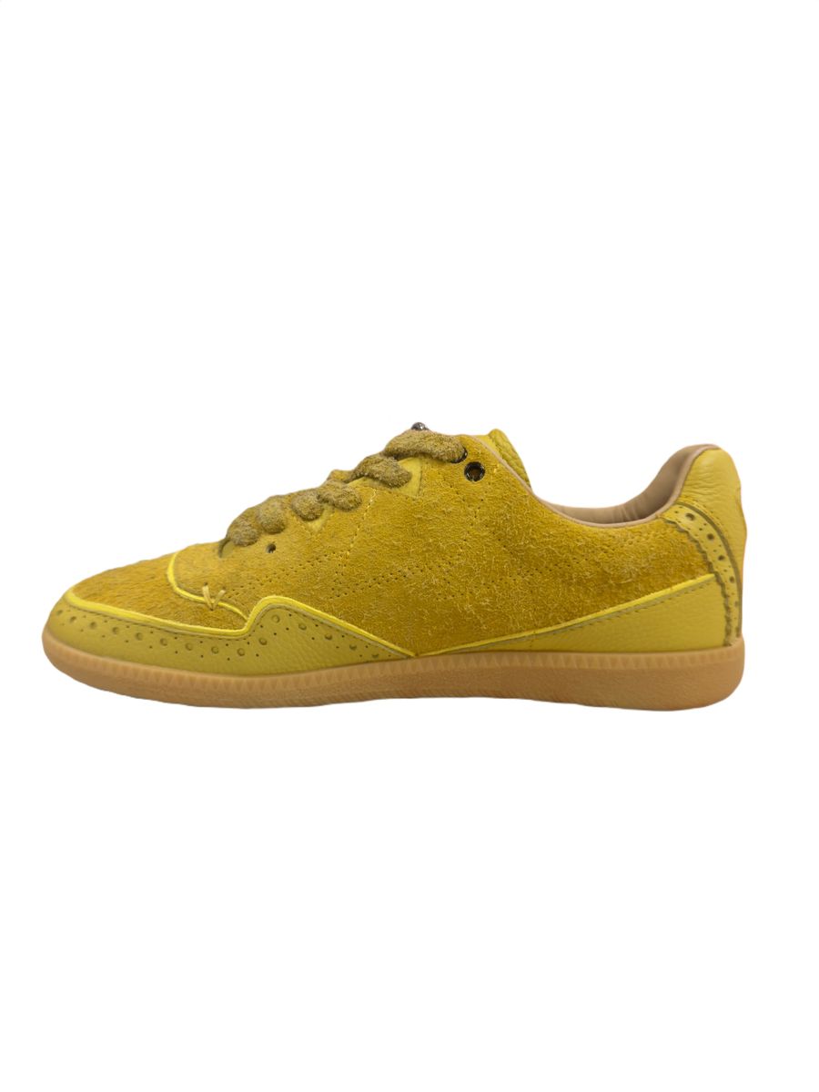 Yellow sneaker on a white background