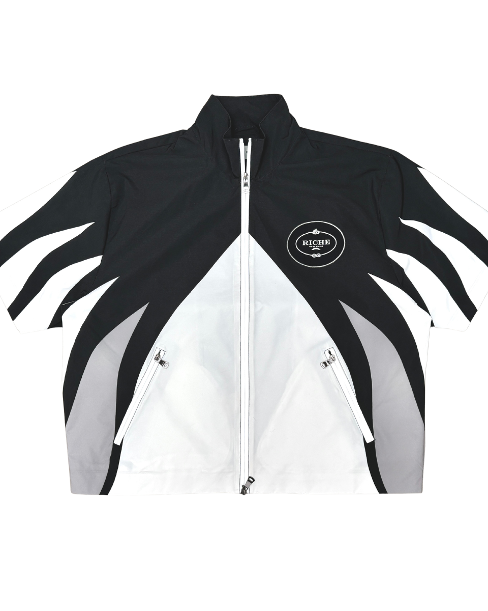 Black and white jacket with a brand logo on a white background