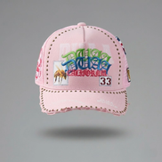 Pink cap with colorful text and graphics on a gray background