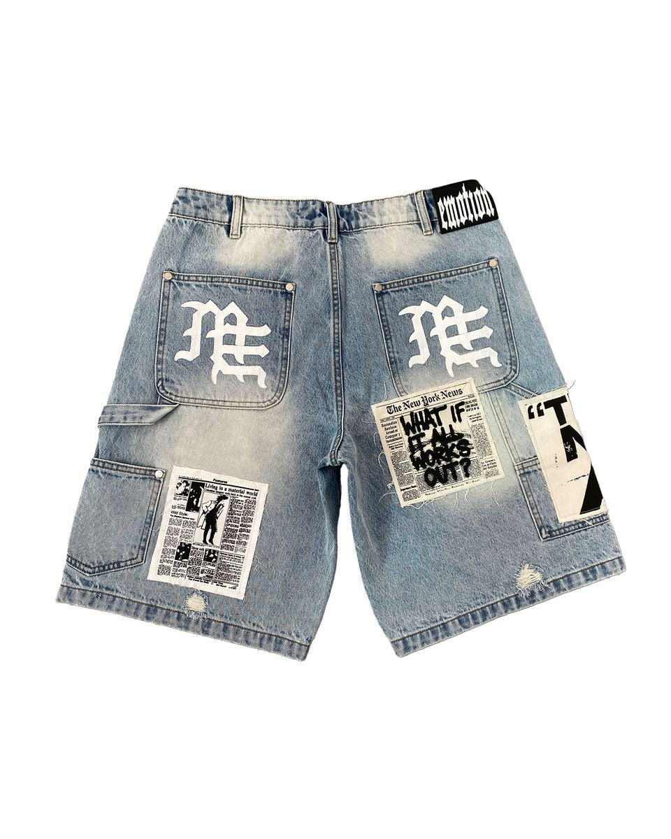 Denim shorts with patches and branding on a white background