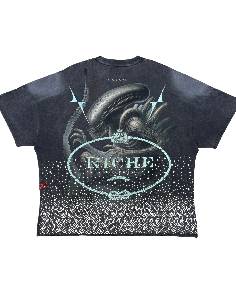 Black t-shirt with alien graphic and 'Riche' text on a white background