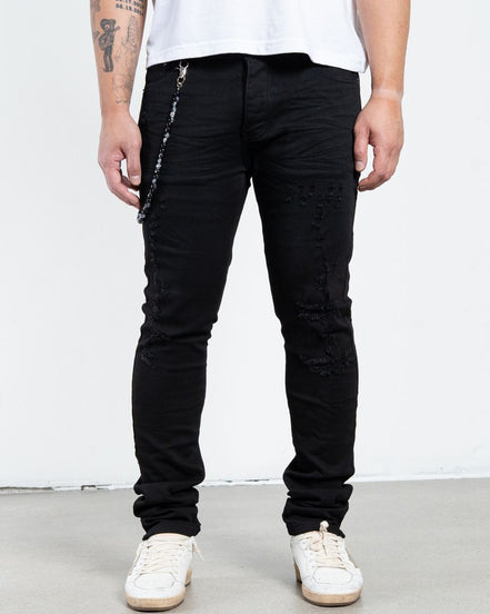 Allan Distressed Skinny Jeans