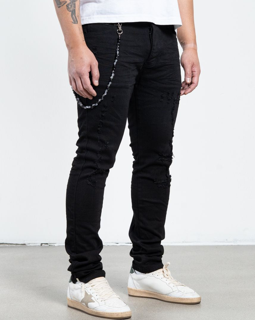 Allan Distressed Skinny Jeans
