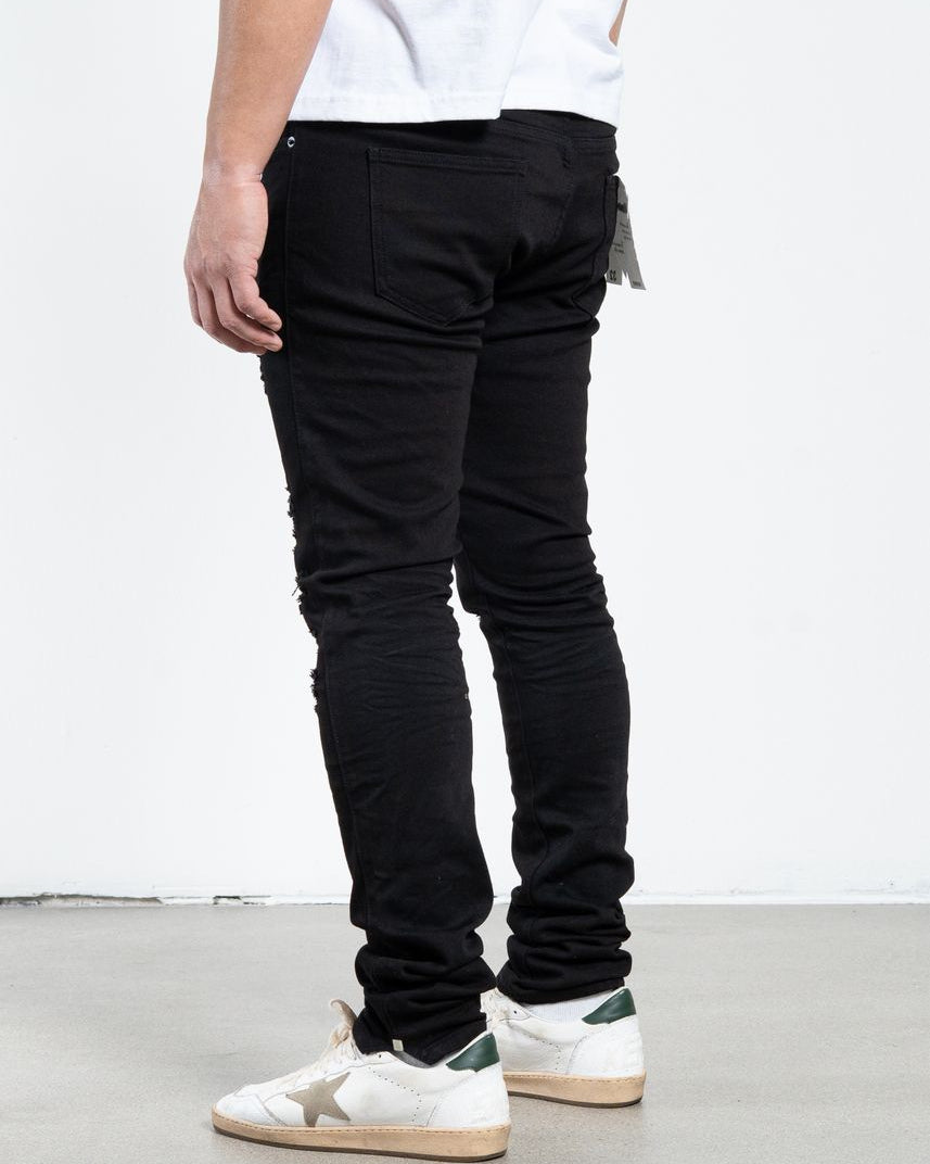 Allan Distressed Skinny Jeans