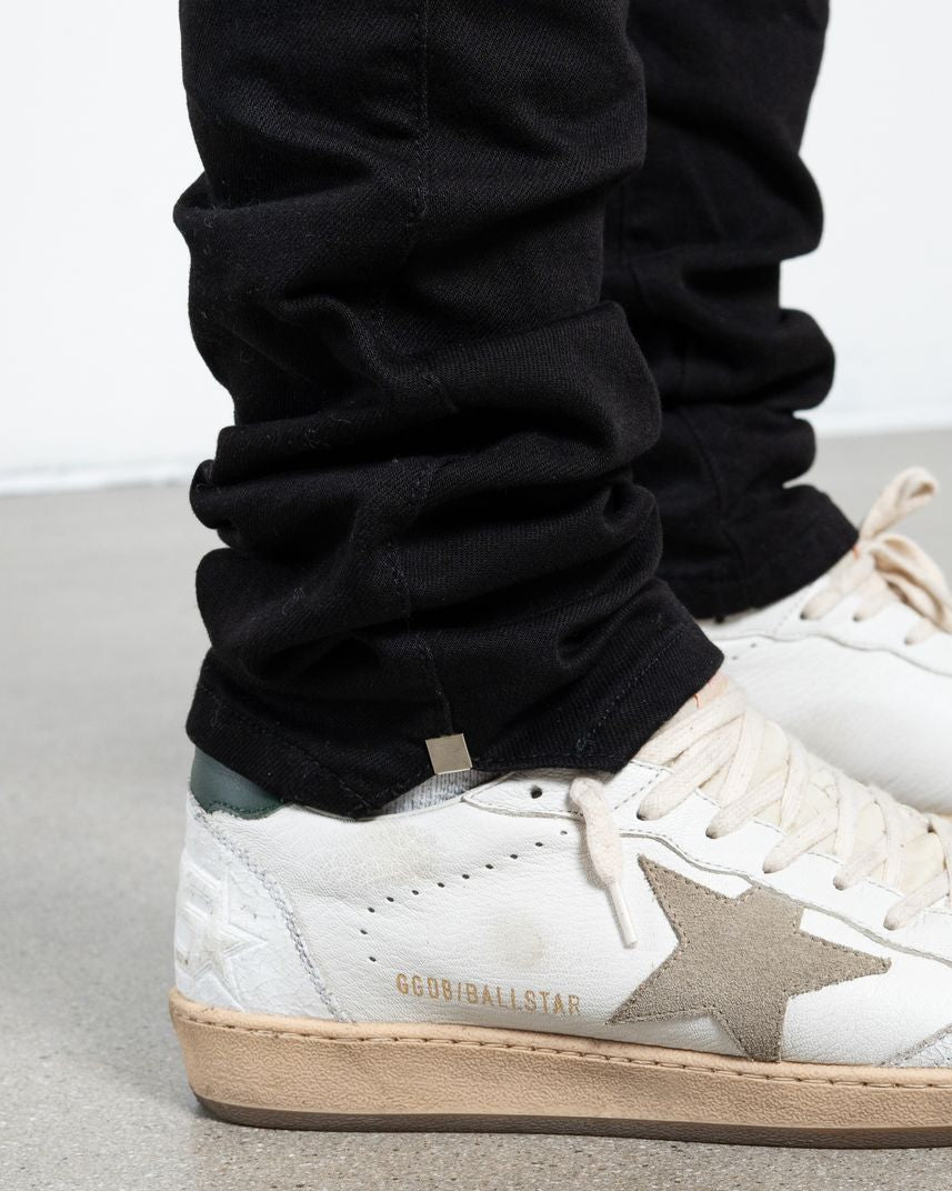 Allan Distressed Skinny Jeans