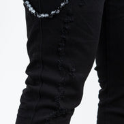 Allan Distressed Skinny Jeans