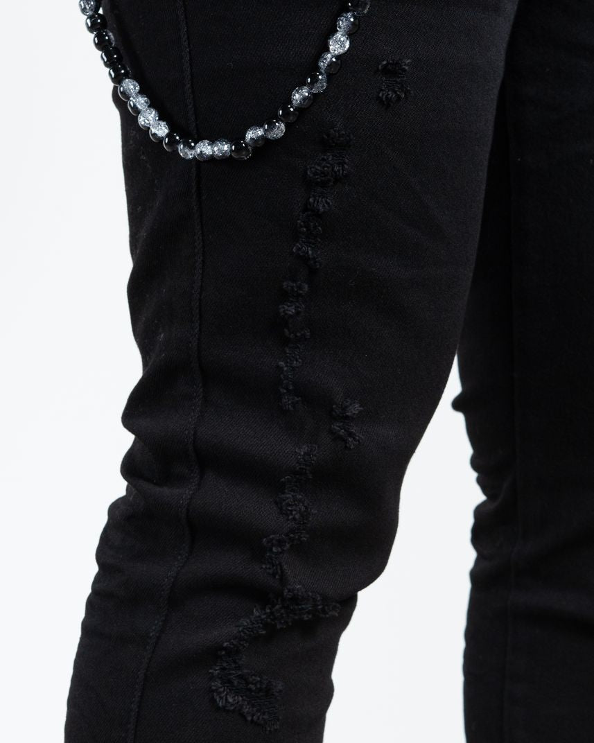 Allan Distressed Skinny Jeans