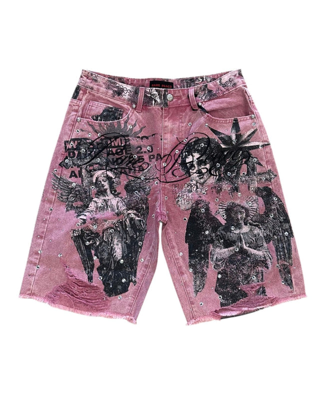 Pink denim shorts with black graphic designs on a white background