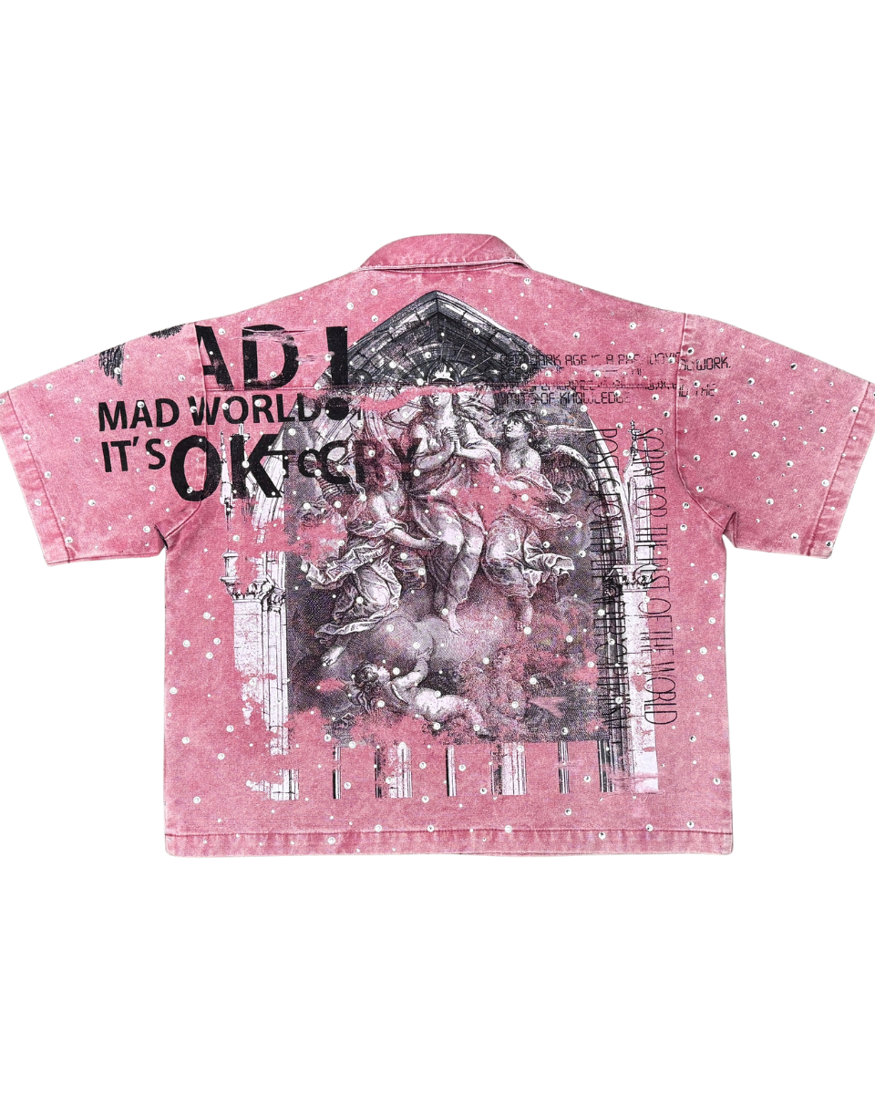 Pink denim shirt with graphic design and text on a white background