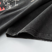 Black t-shirt with text and graphics on a white background