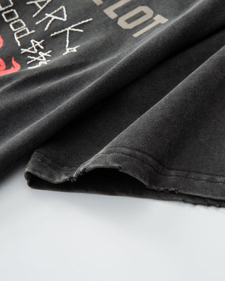 Black t-shirt with text and graphics on a white background