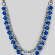 Beaded pant chain with blue beads on a white background