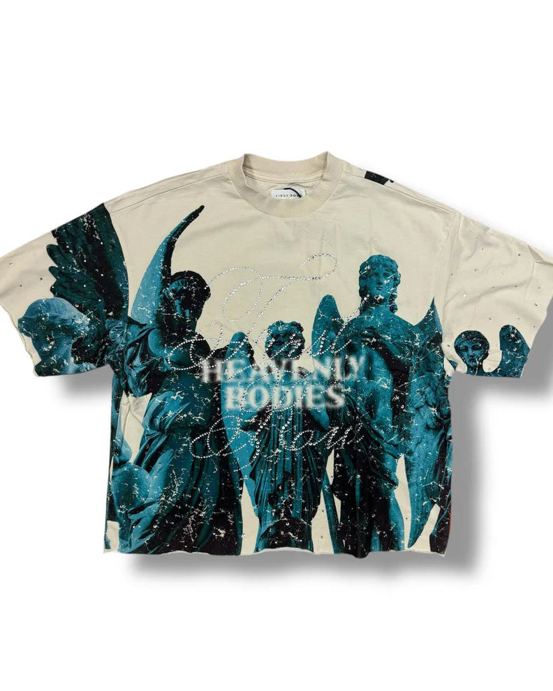 T-shirt with artistic design and text on a beige background