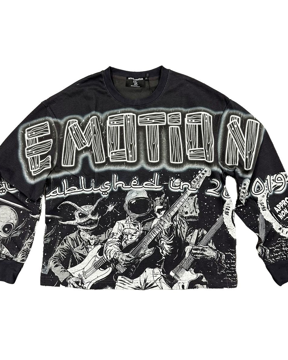 Graphic long sleeve washed black in color with white graffiti graphics. 