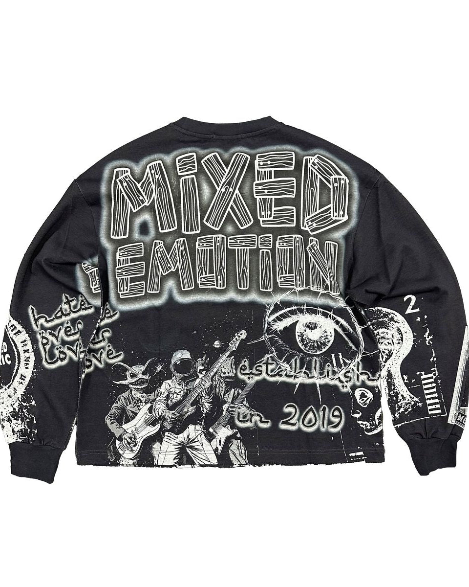 washed black long sleeve with graffiti like graphics all over it. 
