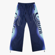Blue pants with a brand logo on a white background