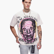 Man wearing a white t-shirt with graphic design and text on a white background