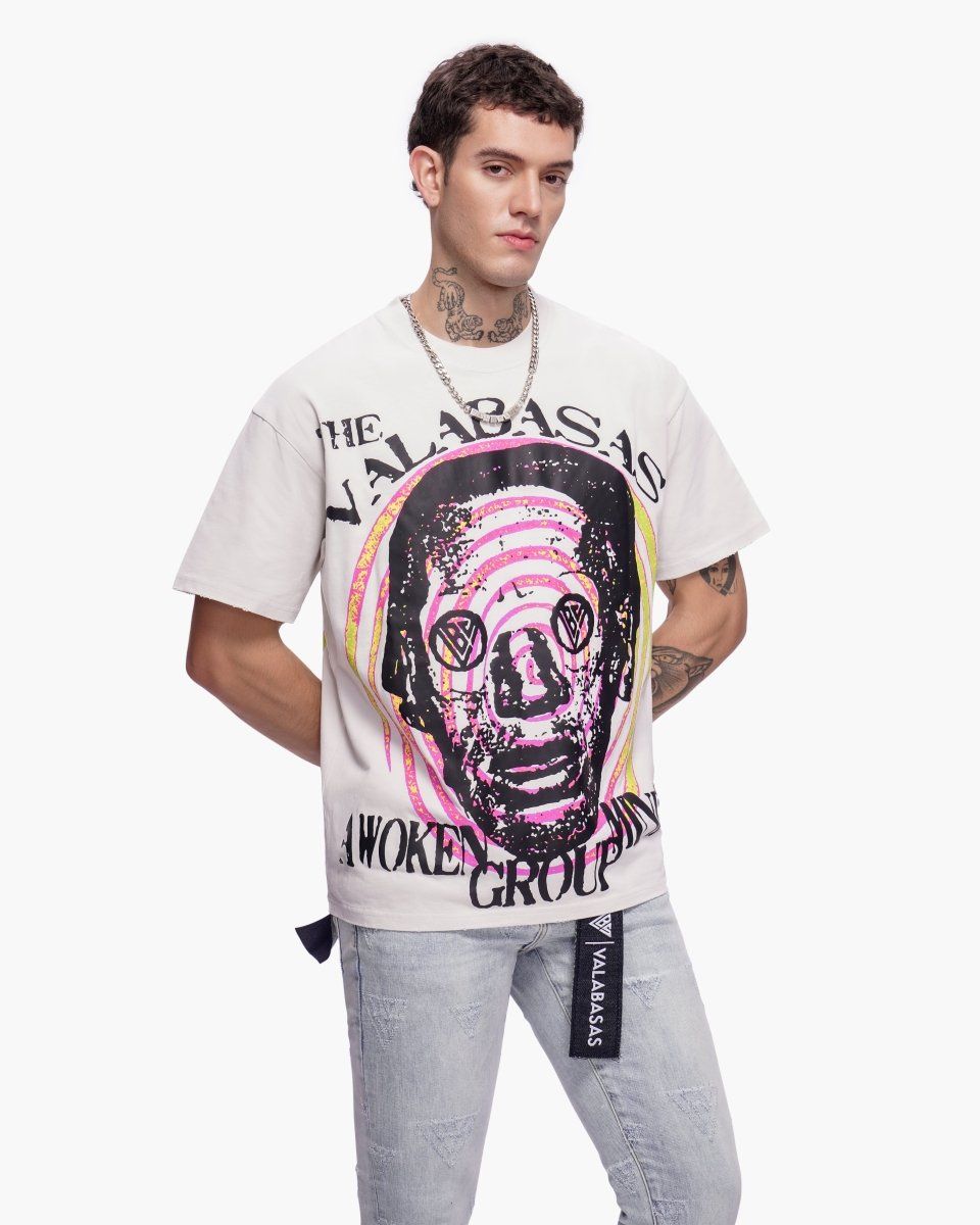 Person wearing a white t-shirt with graphic design and text on a white background