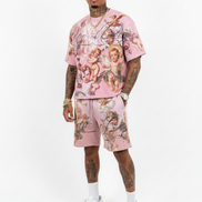 Man wearing a pink floral outfit on a white background