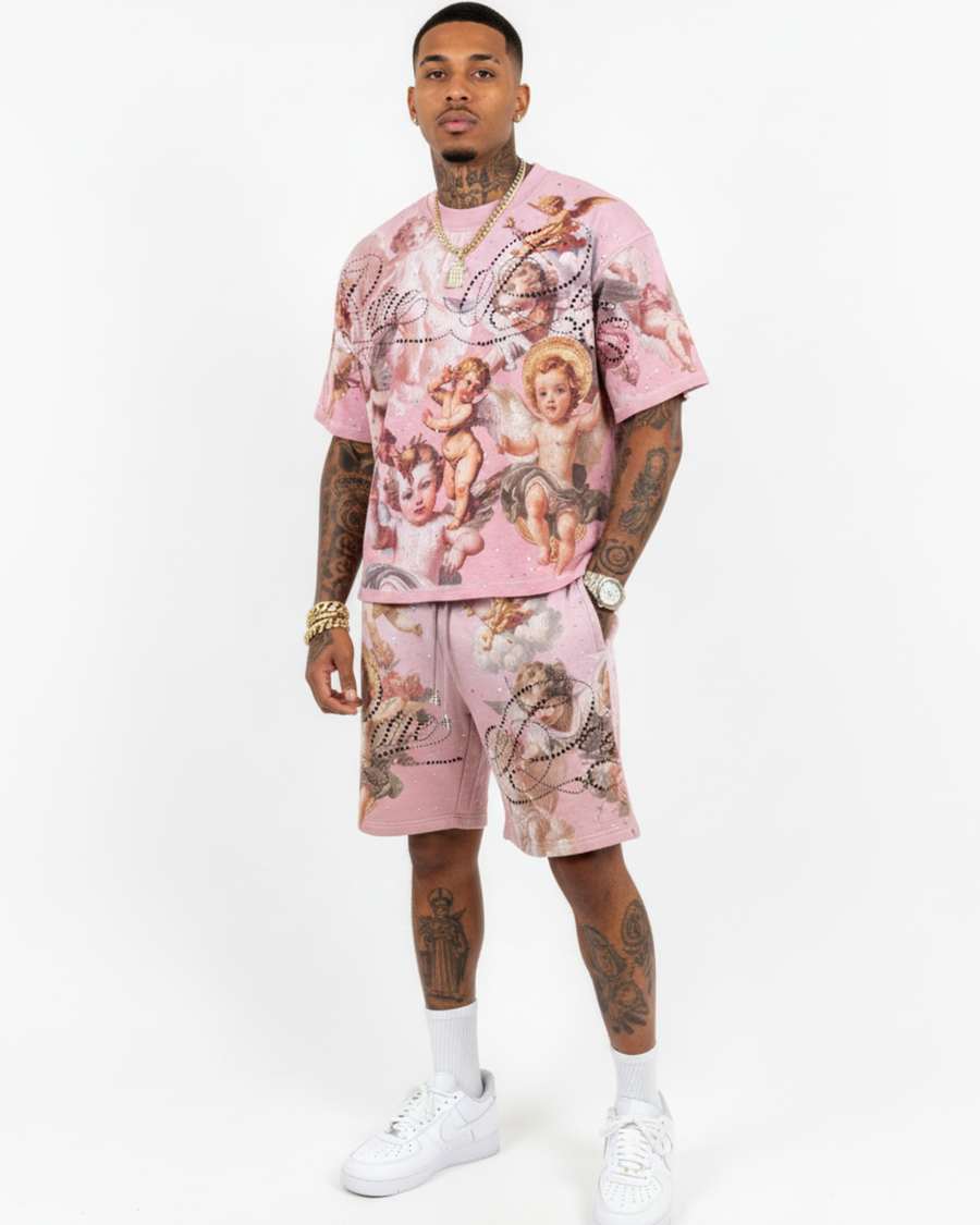Man wearing a pink floral outfit on a white background
