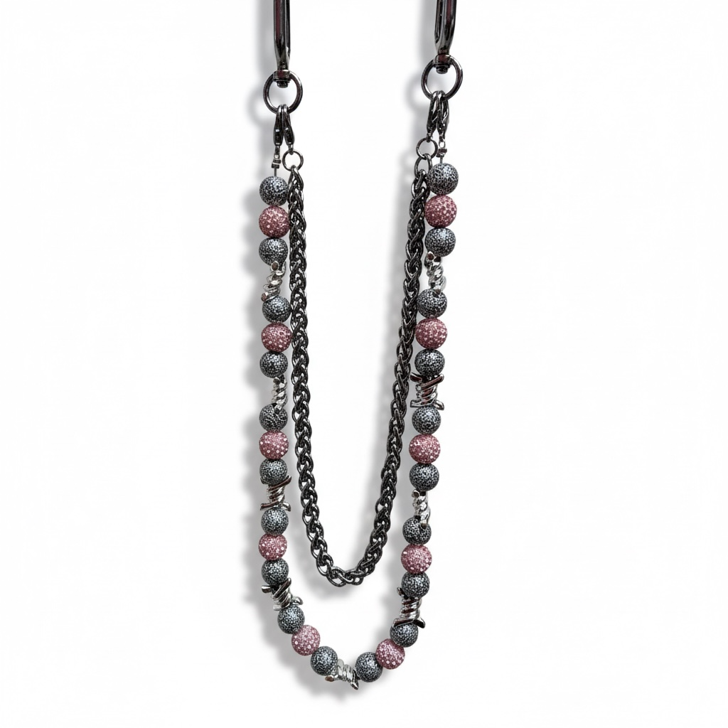 WALLET CHAIN with pink and black beads on a white background