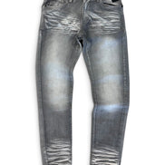 Distressed gray denim jeans with a faded wash and ripped detailing, shown flat against a white background.