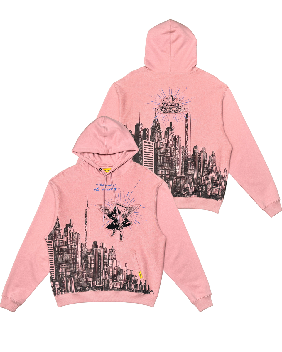 Pink hoodie with cityscape design on a white background