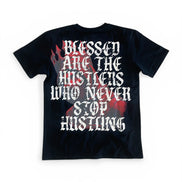 Black t-shirt with motivational quote on a white background