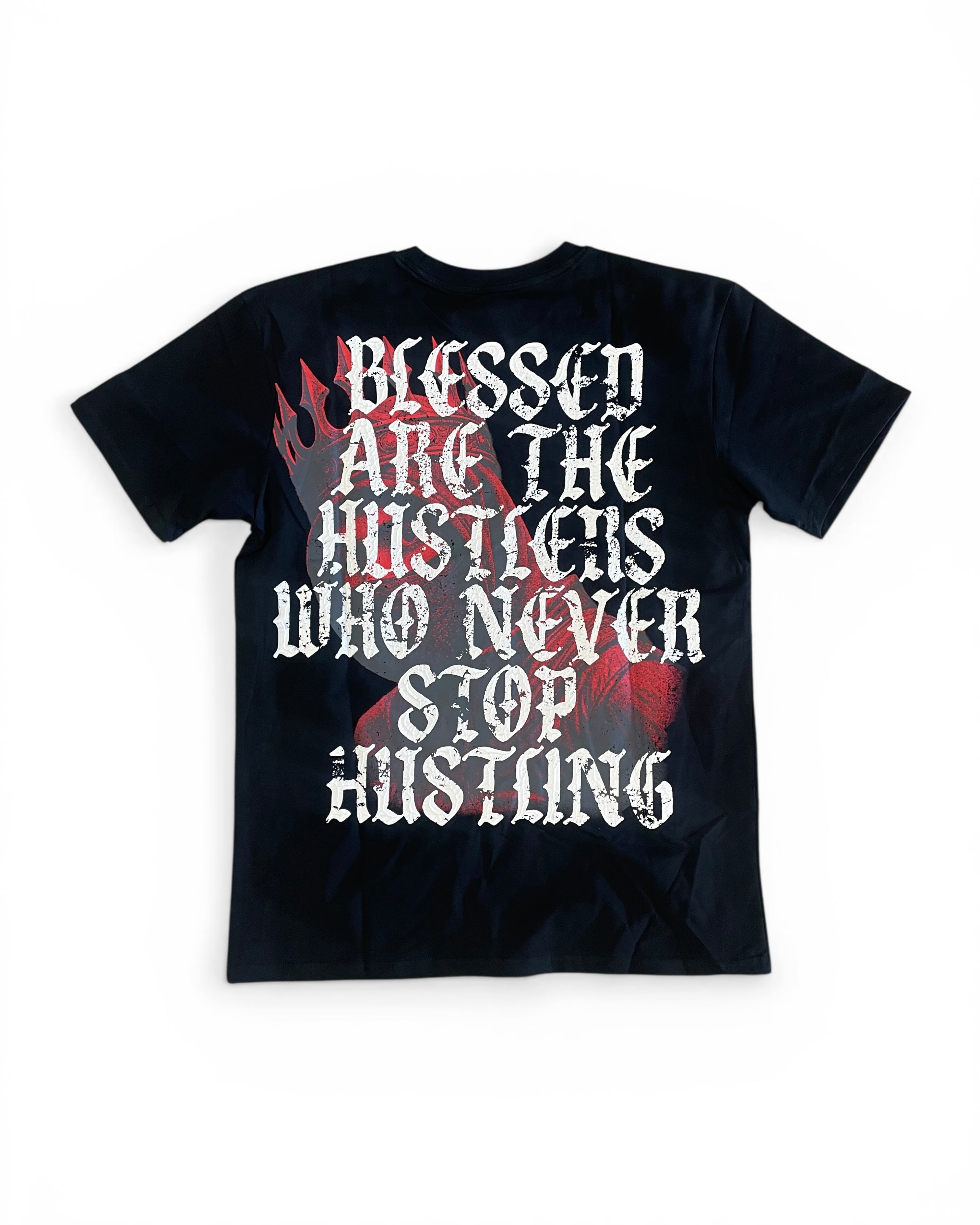 Black t-shirt with motivational quote on a white background