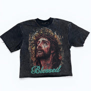 Black t-shirt with a graphic of a face and 'Blessed' text on a white background