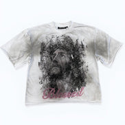 White t-shirt with black graphic design and 'Blessed' text on a white background
