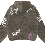 Gray hoodie with graffiti-style text and symbols on a white background