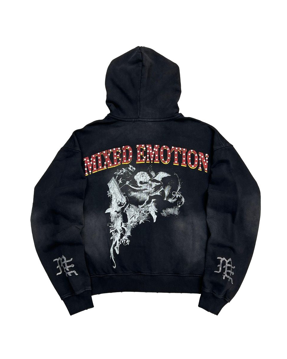 washed black hoodie with graphics and rhinestone details.