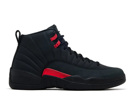 Black high-top sneaker with red accents on a white background