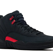 Black high-top sneaker with red accents on a white background