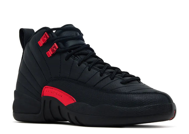 Black high-top sneaker with red accents on a white background