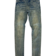 A pair of slim-fit blue jeans with a faded, distressed wash, laid flat against a white background. The brand name 'GABRIEL' is visible on the inner waistband label.