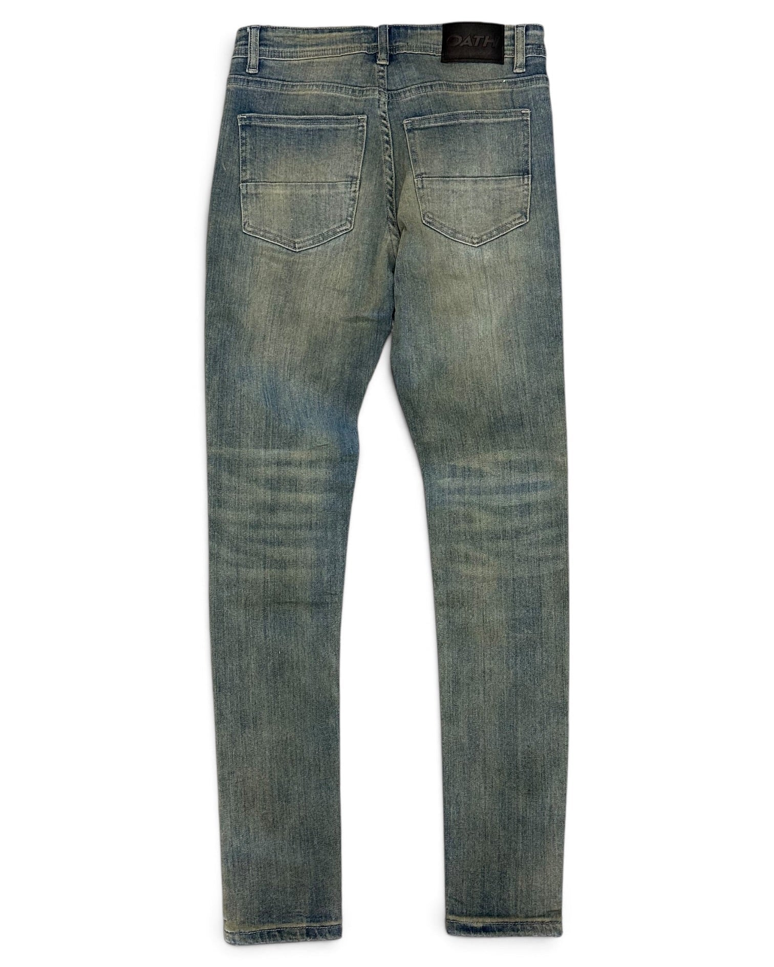 Back view of slim-fit blue denim jeans with a faded wash, showing the back pockets and waistband on a white background.