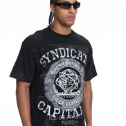 Man wearing a black t-shirt with 'Syndicate Capital' design on a white background
