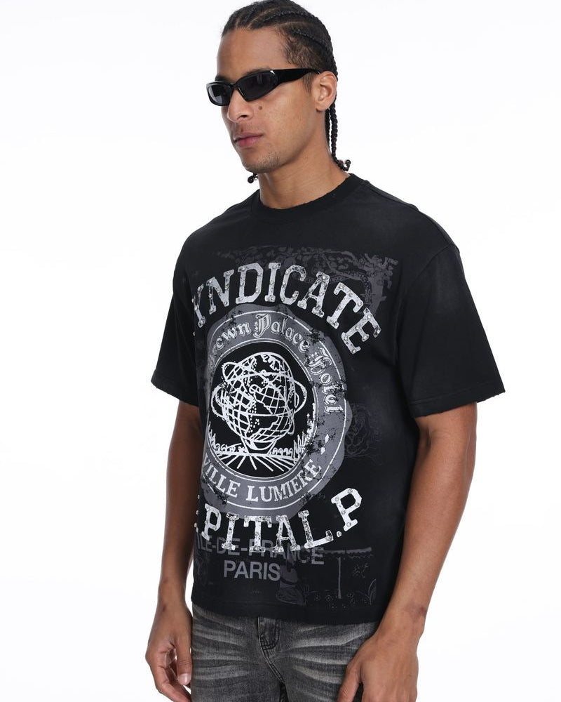 Man wearing a black t-shirt with white text and graphics on a white background