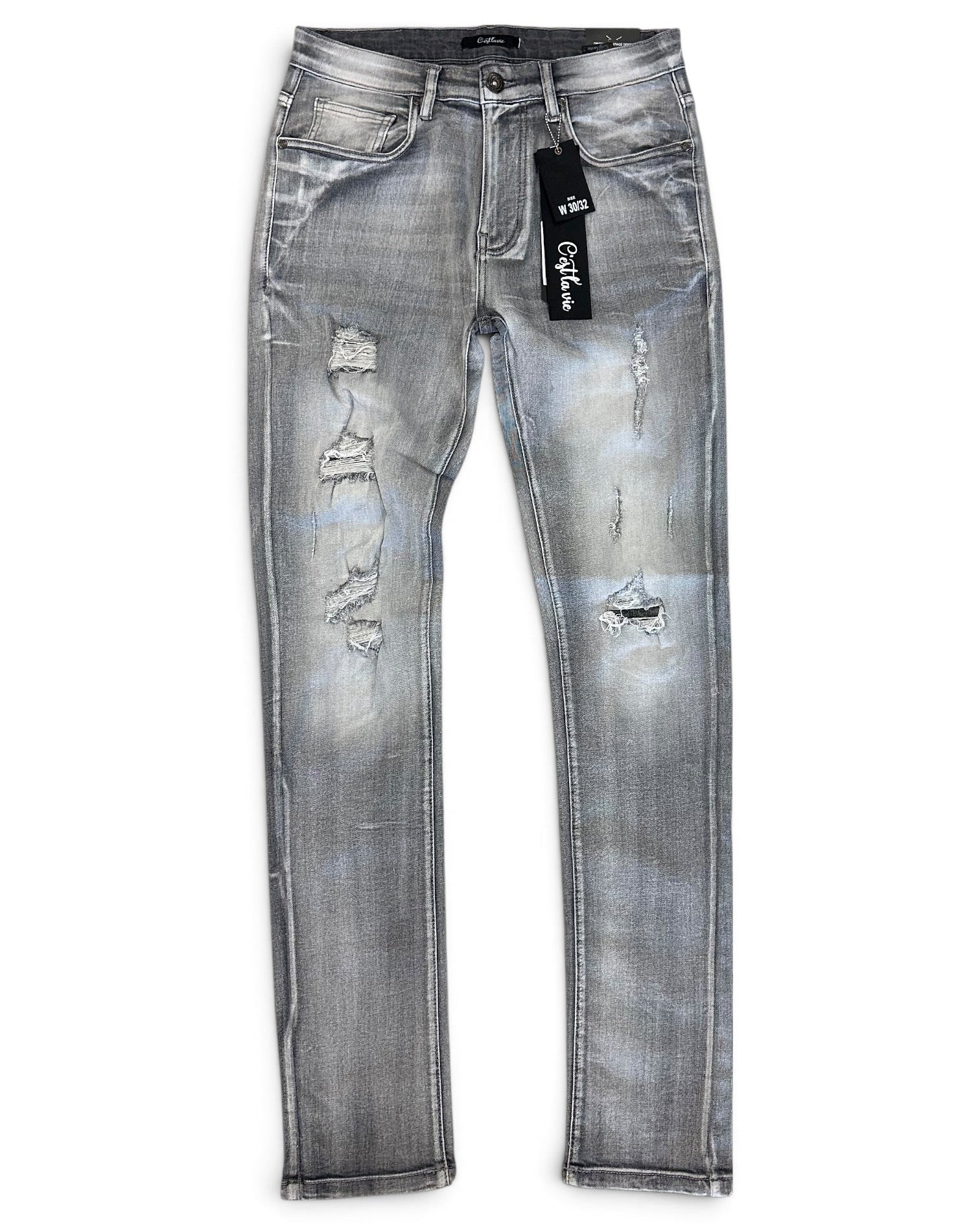 Light gray washed denim jeans with distressed rips on the front, shown flat against a white background with a black brand tag attached.