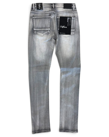Back view of a pair of slim-fit jeans in a washed gray denim wash, featuring black brand patches on the back pockets and waistband.