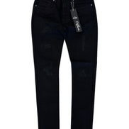 Black distressed skinny jeans with ripped details on the thighs and knees, shown flat against a white background with a hangtag attached.